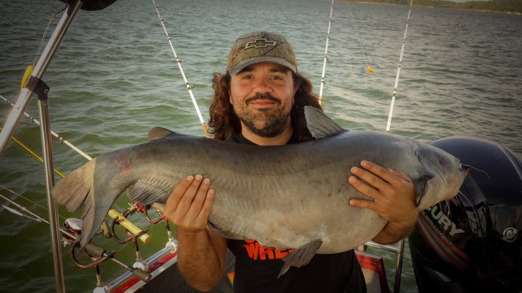 Chris Adkins with a citation blue catfish