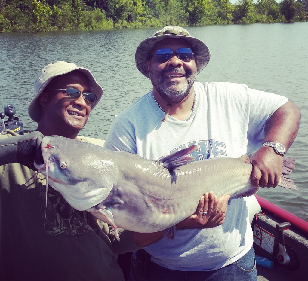 Richard Jenkins and Jerry Mayo saying cheese with a citation blue cat!