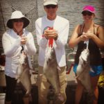 The Calvert family enjoyed this triple hookup to end a good day of fishing.