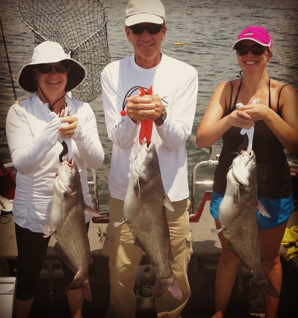 The Calvert family enjoyed this triple hookup to end a good day of fishing.