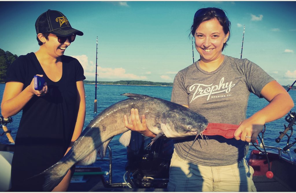 Nicole Stewart of NC Conservation Network dropped by with her sister to reel in some cats.